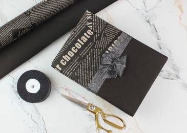 Папір пакувальний крафт бурий "Газета чорна+тонування чорним" в рулоні (0,7м х8м) 120г/м² 255-5010